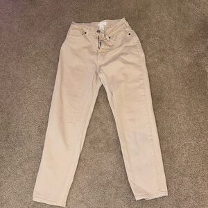 H & M Tan Jeans Size 4- imperfection on back as shown in picture